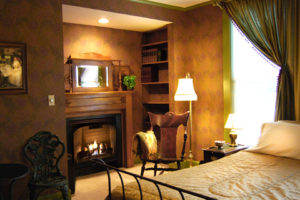 Astor House room with fireplace