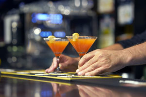 Barman serving elegant cocktails at a best restaurant in Green Bay